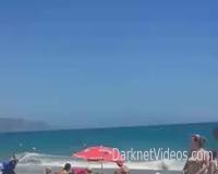 Girl caught masturbating on public beach